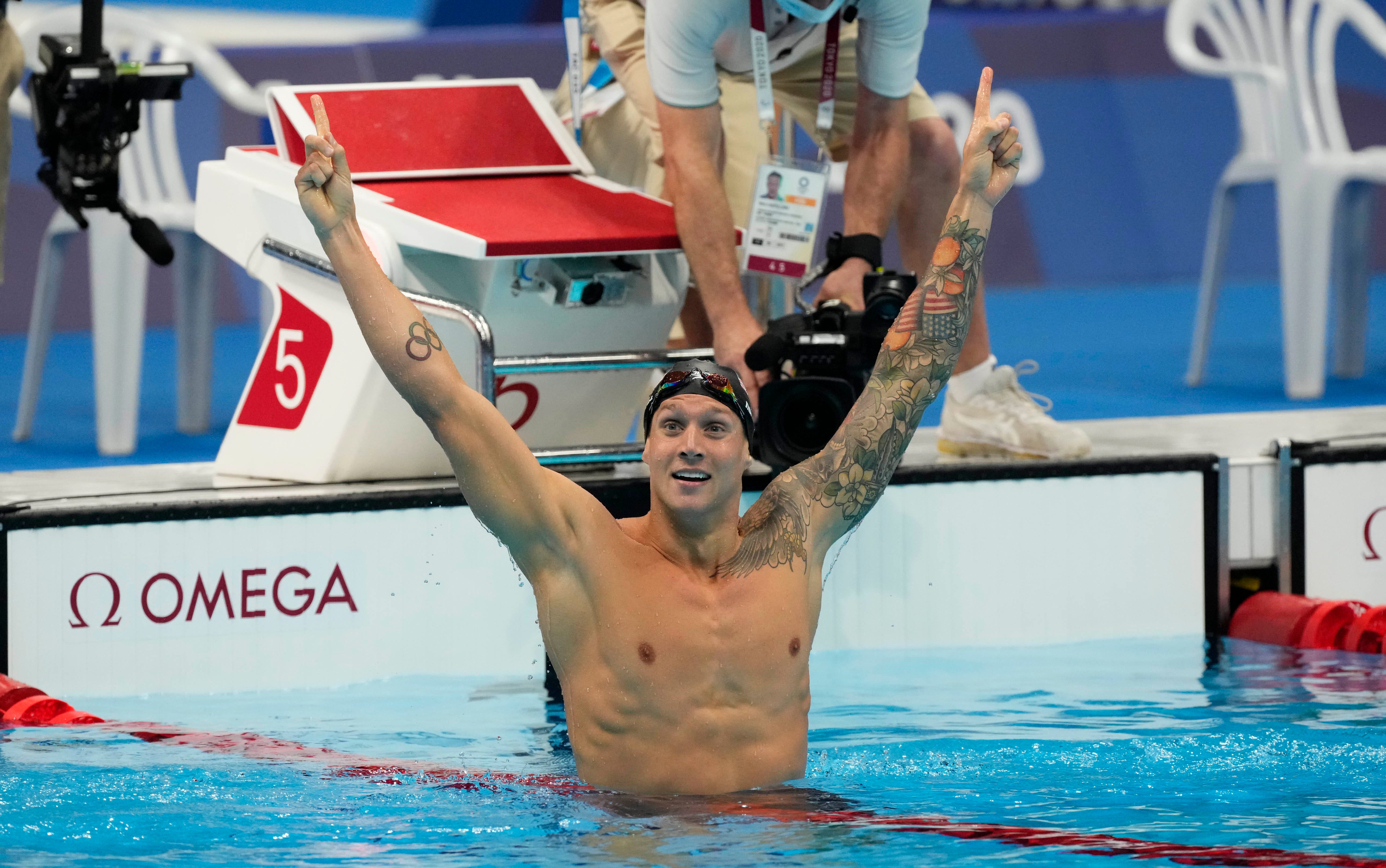 Caeleb Dressel (USA) celebrates after winning the men's 100m freestyle final during the Tokyo 2020 Olympic Summer Games at Tokyo Aquatics Centre on Jul 29, 2021.