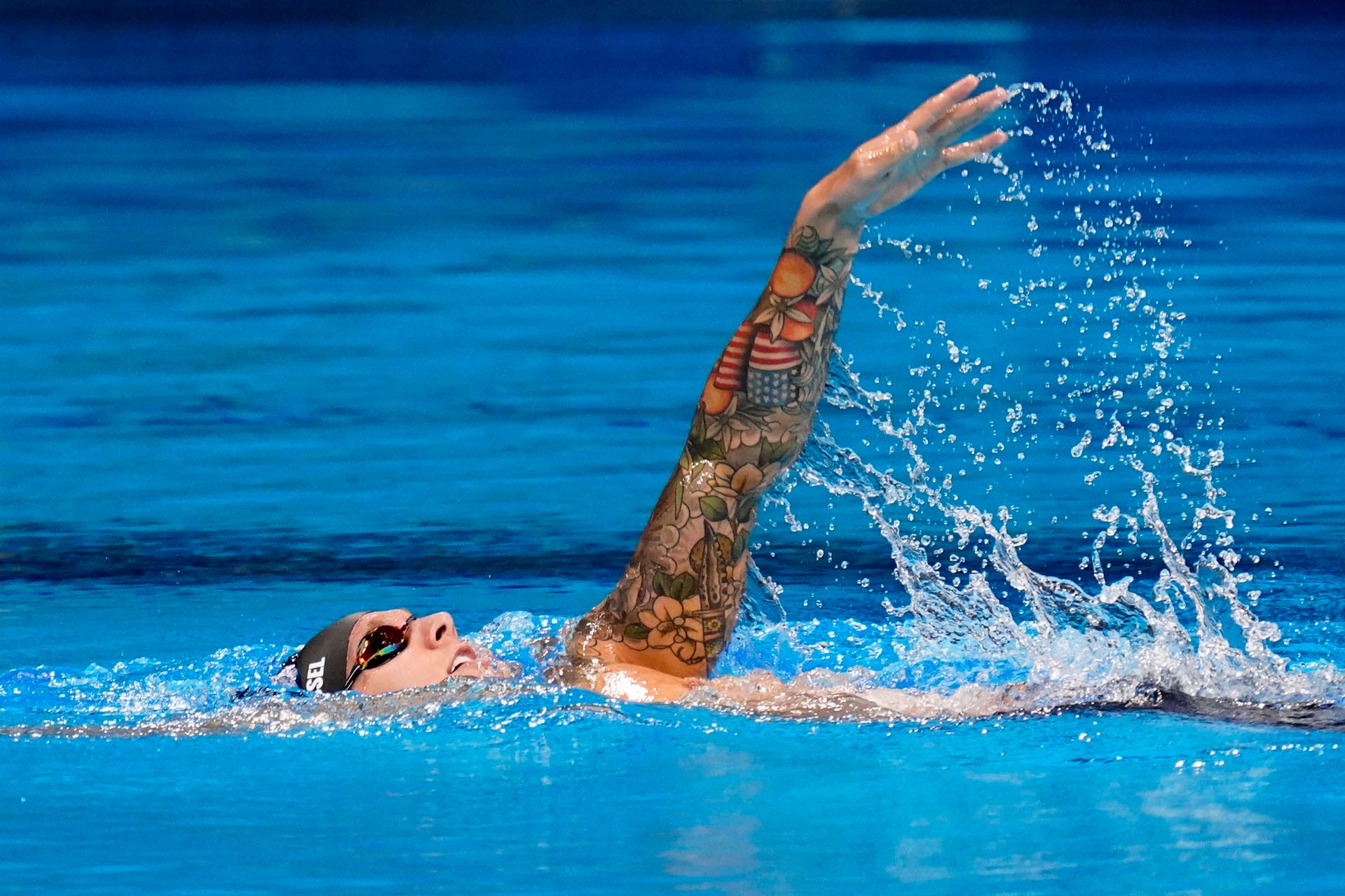 July 31, 2021: Caeleb Dressel (USA) cools down after winning the men's 50 freestyle semifinal during the Tokyo 2020 Olympic Summer Games at Tokyo Aquatics Centre.